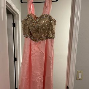 Pretty in pink dress. Lots of gems in top